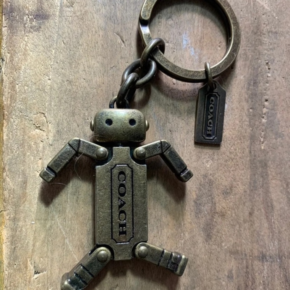 Coach brass robot keychain